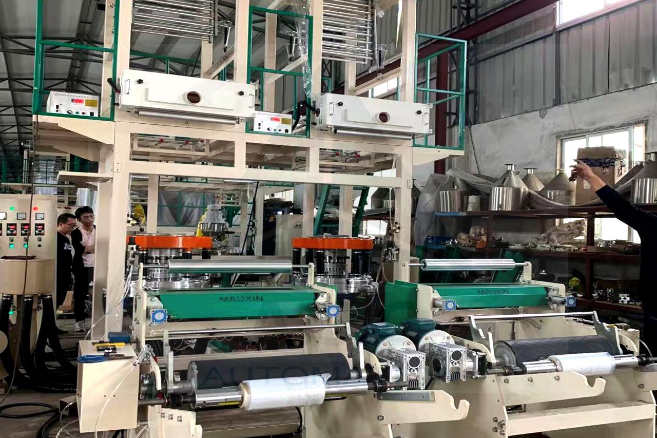 Cụm lô và bộ phận thu cuộn trên máy thổi màng nilon